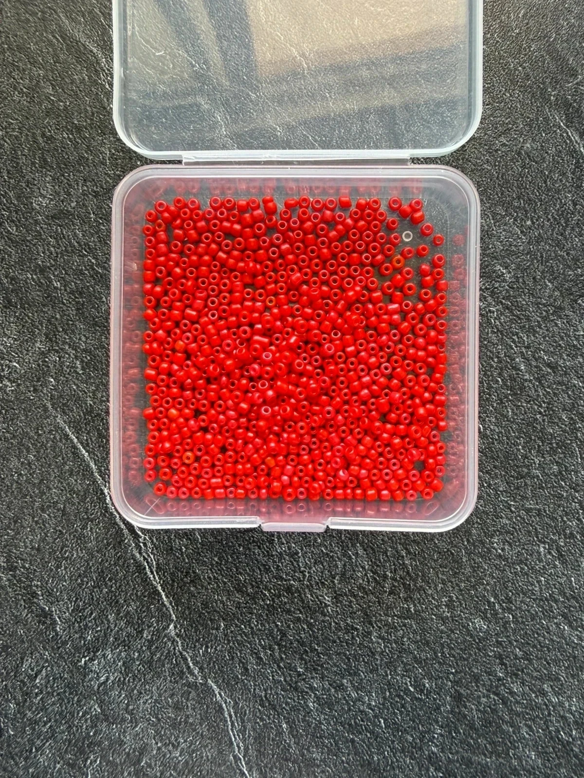 Perle de rocaille rouge reflet orangé LCP6190